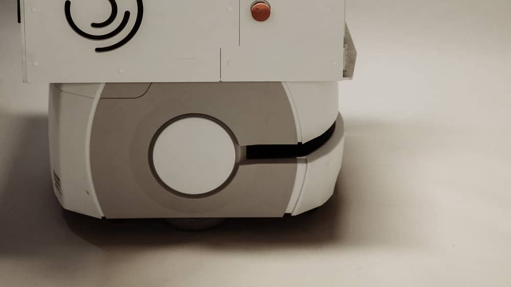 Close-up of an industrial robotic arm at work