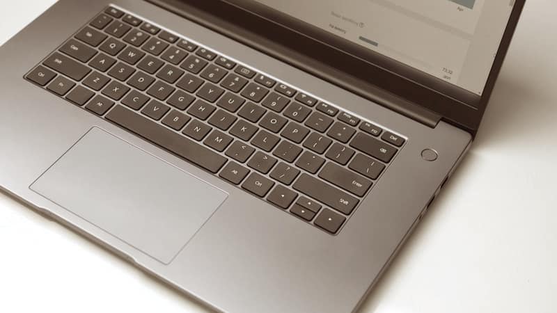 Open laptop on a clean white desk